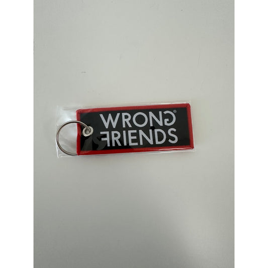 WRONG FRIENDS WRONG FRIENDS WOOVEN KEYCHAIN POS-materiaal RED